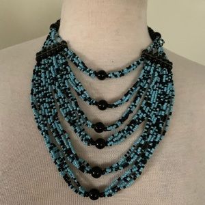Vintage woman’s blue and black 6 strands beaded necklace